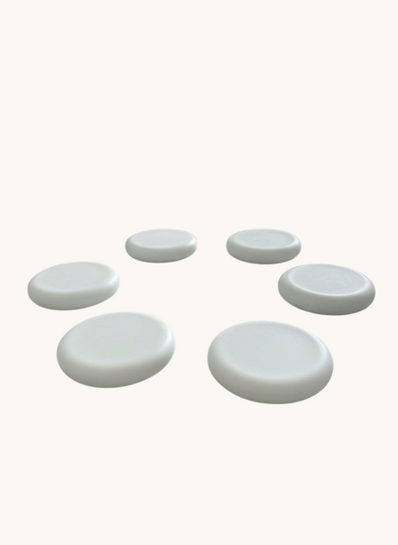 Green rounf soap bar on the counter
