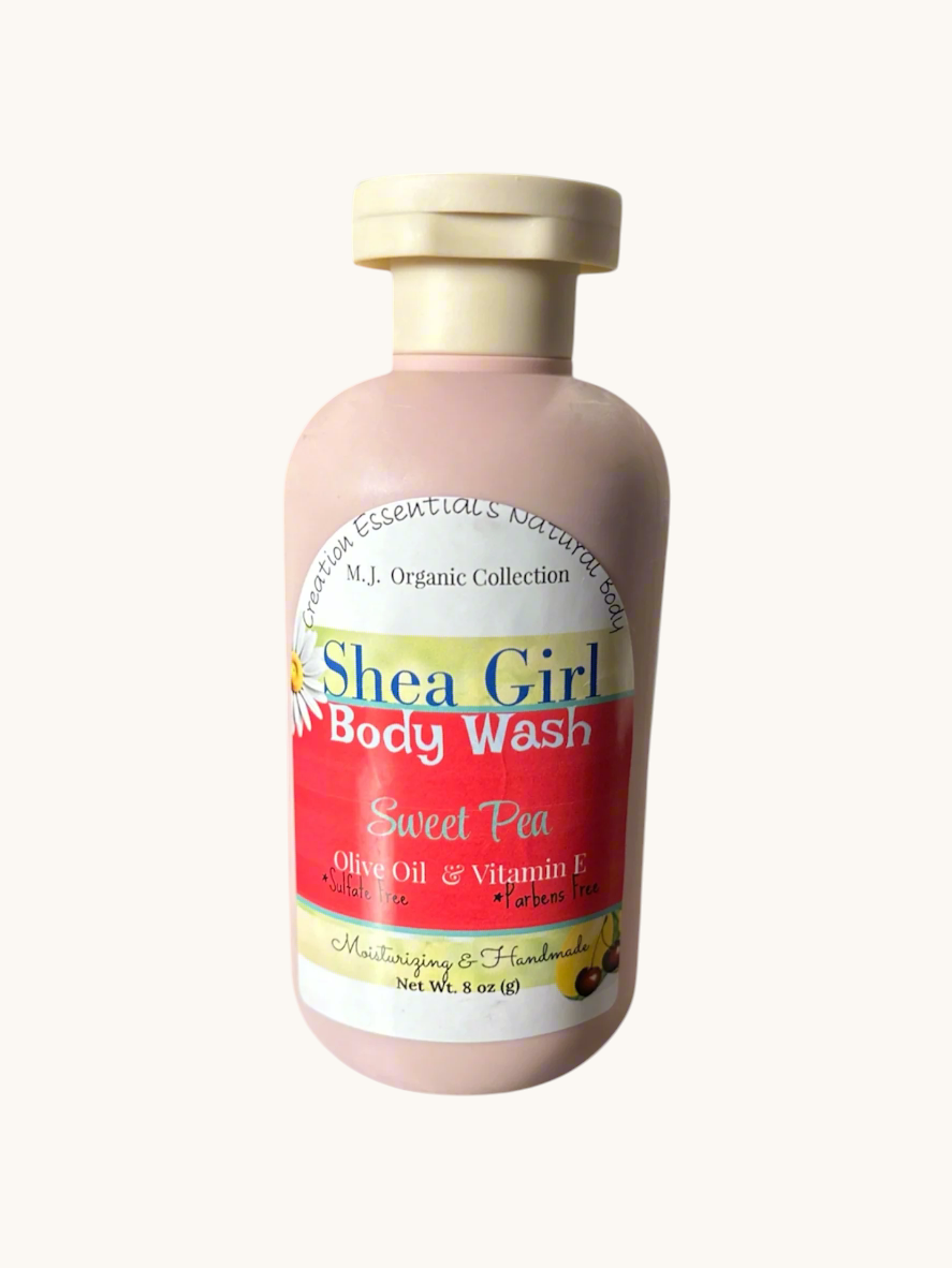 Creation Essential's Natural Body Shea Girl Sweet Pea Body Wash in a pink bottle with a flip-top cap.