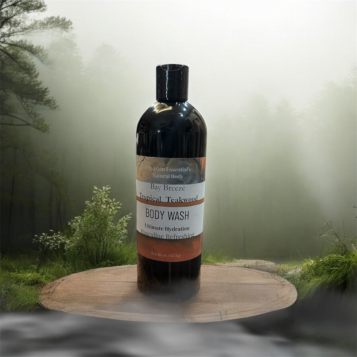 Creation Essential's Natural Body Bay Breeze Tropical Teakwood organic body wash in a 16oz bottle on a wooden stand.