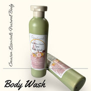 Creation Essential's Natural Body The Perfect Touch Yoni Body Wash in a green bottle with floral label design