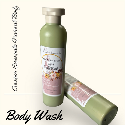 Creation Essential's Natural Body The Perfect Touch Yoni Body Wash in a green bottle with floral label design
