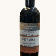 Creation Essential's Natural Body Bay Breeze Tropical Teakwood organic body wash in a 16oz black bottle