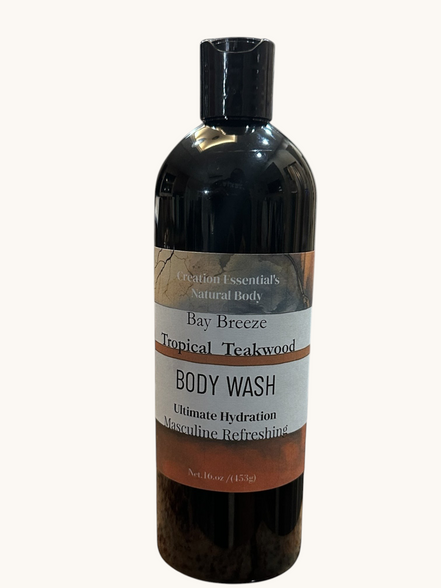 Creation Essential's Natural Body Bay Breeze Tropical Teakwood organic body wash in a 16oz black bottle