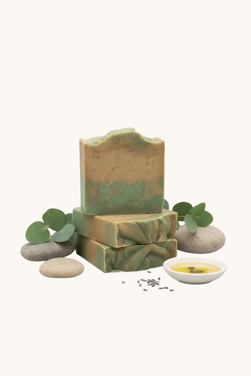 Creation Essential's Natural Body cucumber and melon soap bar with shea butter and aloe vera on a spa-inspired display