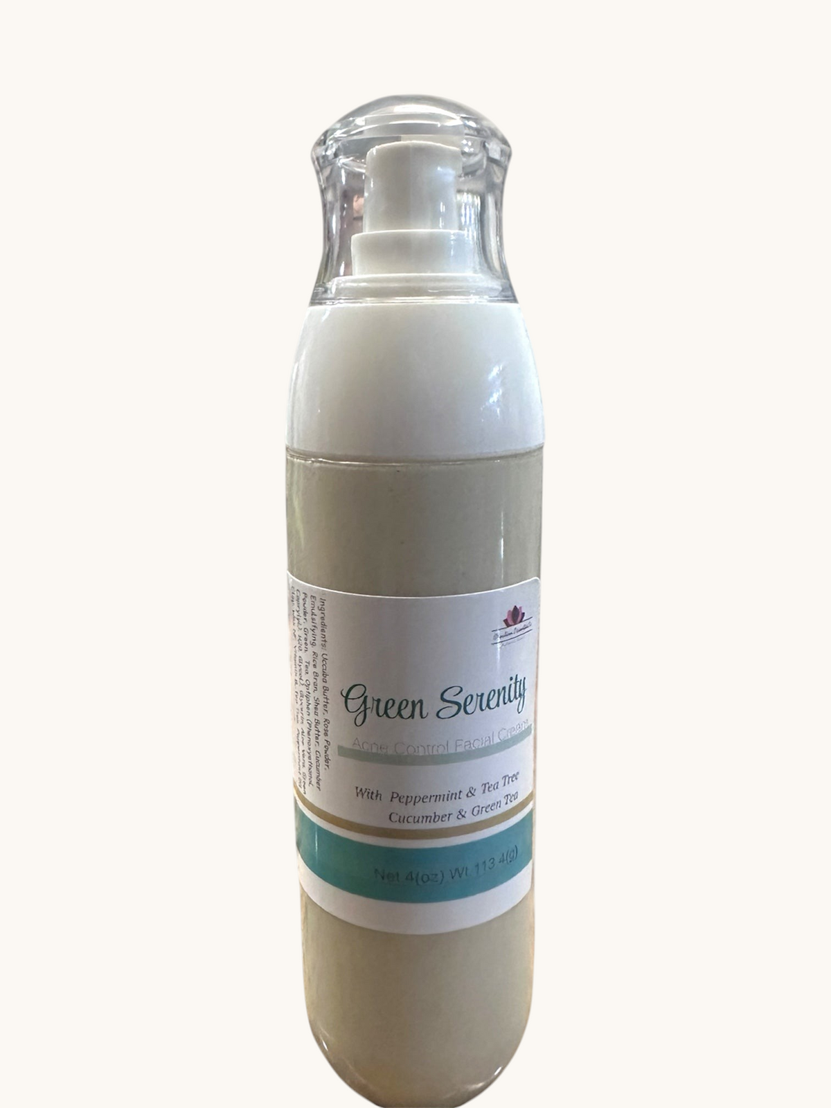 Creation Essential's Natural Body Green Serenity facial cream in a pump bottle with green tea and cucumber extracts.