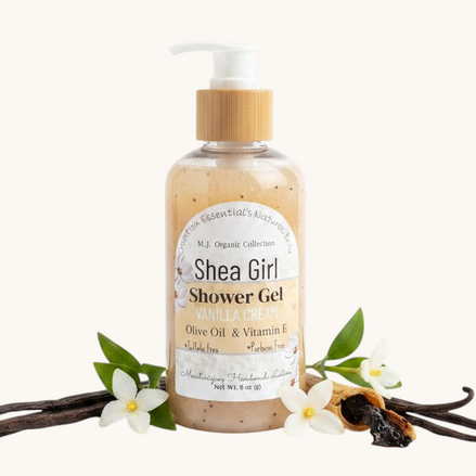 Shea Girl Shower Gel bottle on a wooden surface with a white background