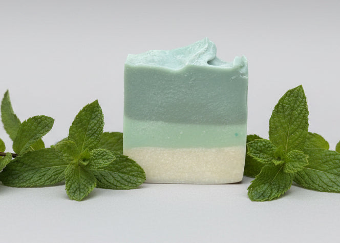 Bar of soap on a speckled countertop