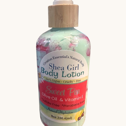 Creation Essential's Natural Body Shea Girl Sweet Pea body lotion in a pump bottle with a marbled mint and pink cream.