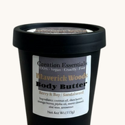 Creation Essential's Natural Body Maverick Woods body butter in a black 4oz jar with berry, bay, and sandalwood scent.