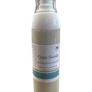 Creation Essential's Natural Body Green Serenity facial cream in a pump bottle with green tea and cucumber extracts.