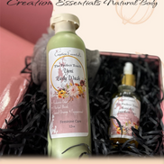 Creation Essential's Natural Body yoni care bundle featuring a green body wash bottle and a dropper bottle of body oil.