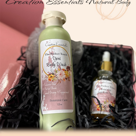 Creation Essential's Natural Body yoni care bundle featuring a green body wash bottle and a dropper bottle of body oil.