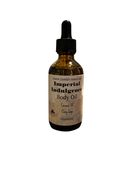 Creation Essential's Natural Body Imperial Indulgence body oil bottle with coconut oil and clary sage on a wooden shelf