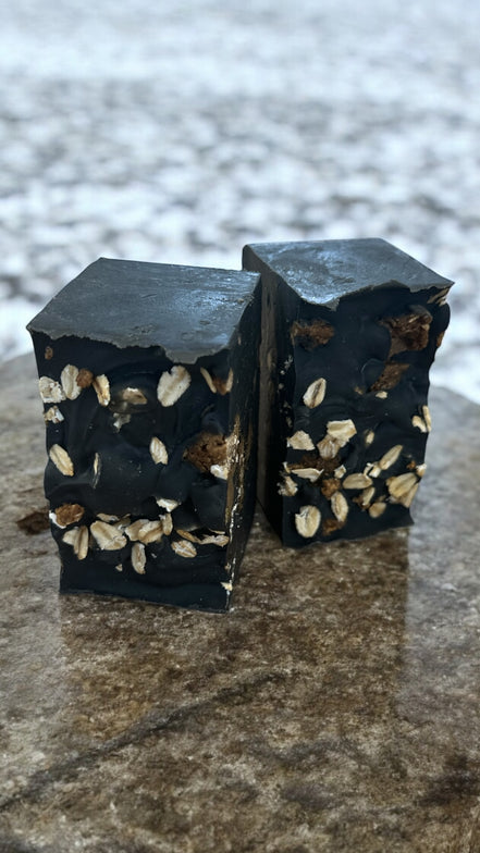 "African black soap bar close-up - handmade organic skincare"