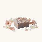 Creation Essential's Natural Body Honey Harvest soap bar with dried flowers, apple and sunflower scent.