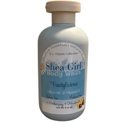 Creation Essential's Natural Body Shea Girl Fruitylicious body wash in an 8 oz bottle with a beige cap.