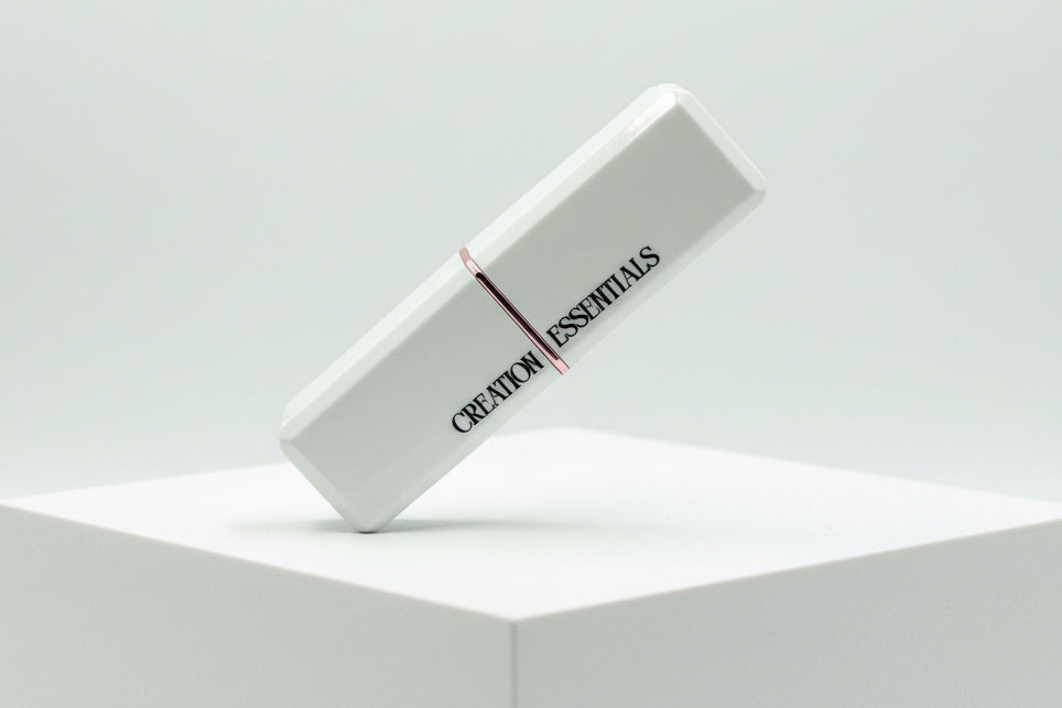 White rectangular product with 'Creation Essentials' branding on a light gray background