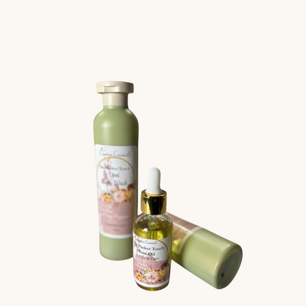 Creation Essential's Natural Body yoni bundle featuring a green body wash bottle and a dropper bottle of herbal oil.