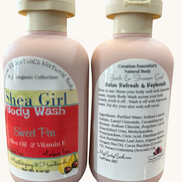 Creation Essential's Natural Body Shea Girl Sweet Pea body wash bottles with moisturizing olive oil and vitamin E