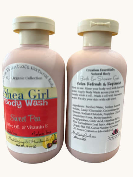 Creation Essential's Natural Body Shea Girl Sweet Pea body wash bottles with moisturizing olive oil and vitamin E