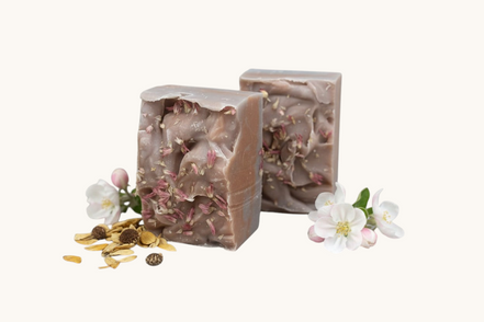 Creation Essential's Natural Body Honey Harvest soap bars topped with dried flowers and apple blossoms