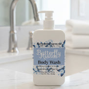 Butterfly Kisses body wash bottle on a bathroom counter