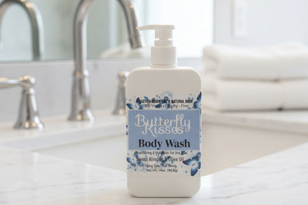 Butterfly Kisses body wash bottle on a bathroom counter