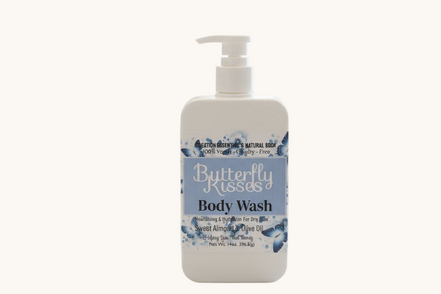 Butterfly Kisses body wash bottle on a bathroom counter