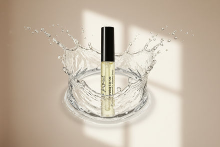Cosmetic bottle with water splash on a beige background