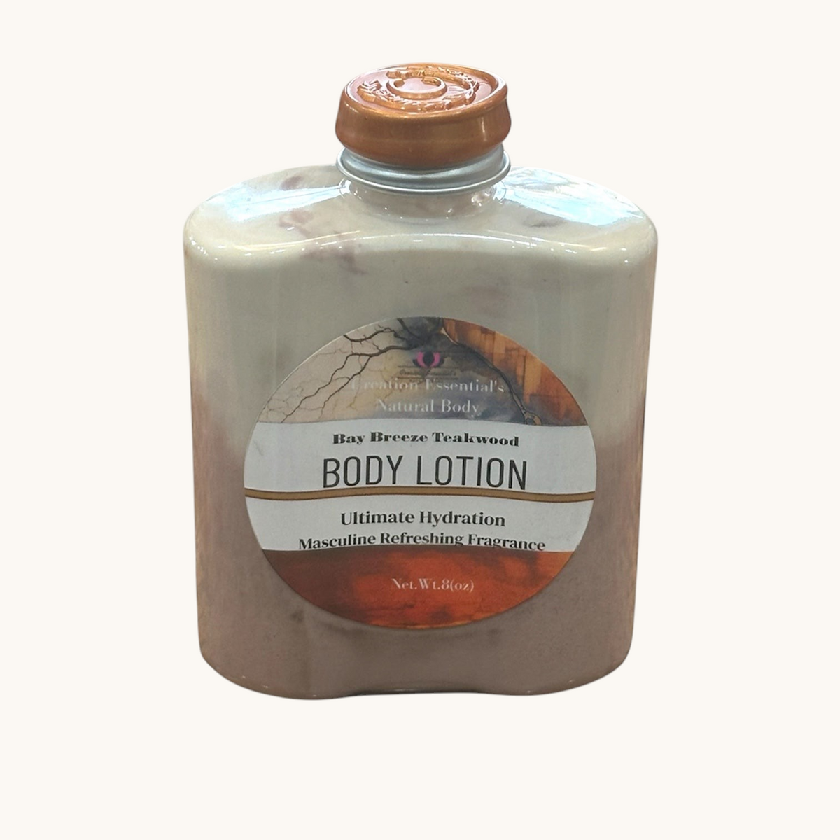 Creation Essential's Natural Body Bay Breeze Teakwood hydrating body lotion in a unique two-tone ceramic-style bottle.