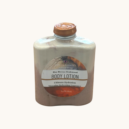 Creation Essential's Natural Body Bay Breeze Tropical Teakwood hydrating lotion in a two-tone bottle