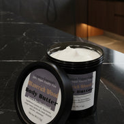 Body butter container with label on a kitchen counter