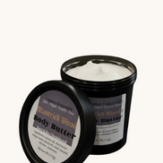 Body butter container with label on a kitchen counter