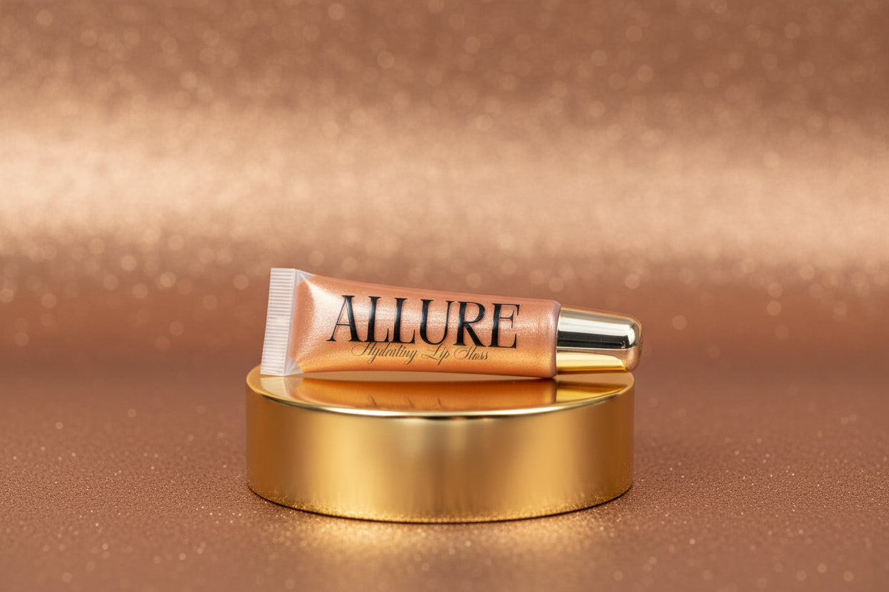 Lip gloss tube with 'Allure' branding on a marbled surface