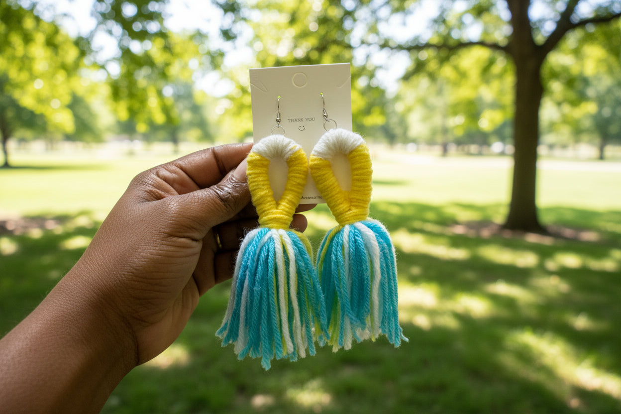 Add a bohemian flair to your look with these handcrafted yarn earrings from Creation Essentials Fashion Associates.