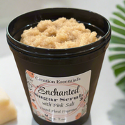 Jar of Enchanted Sugar Scrub with Pink Salt on a marble surface