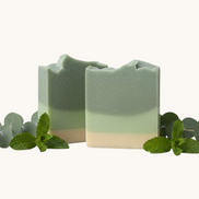 Creation Essential's Natural Body eucalyptus and spearmint bar soap with raw honey and aloe vera on a white background