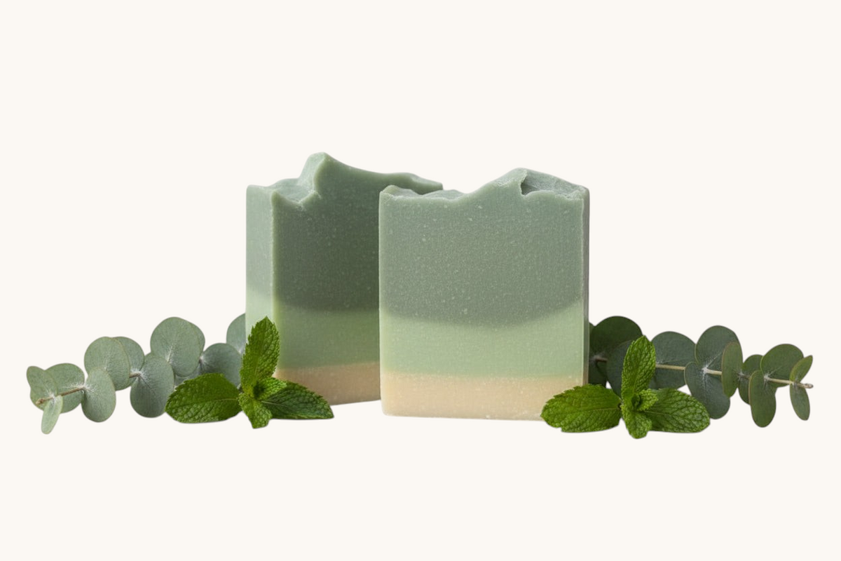 Creation Essential's Natural Body eucalyptus and spearmint bar soap with raw honey and aloe vera on a white background