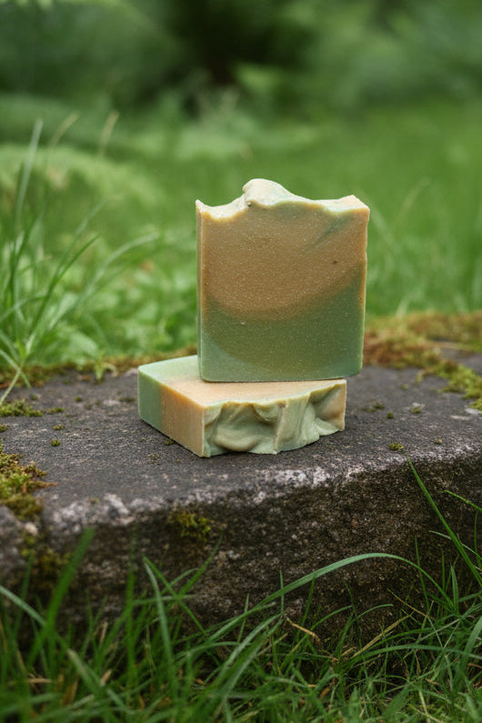 Green soap bar on a granite countertop