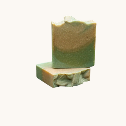 Green soap bar on a granite countertop