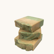 Creation Essential's Natural Body cucumber and melon hydration soap bar stack with green and tan marbled texture