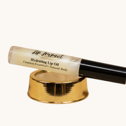 Lip Impact hydrating lip oil on a white background