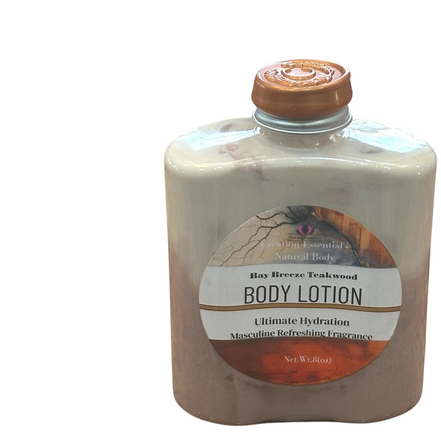 Creation Essential's Natural Body Bay Breeze Teakwood hydrating lotion in a flat bottle on a wooden surface.