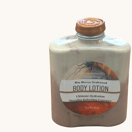 Creation Essential's Natural Body Bay Breeze Tropical Teakwood hydrating body lotion in an 8oz bottle on wood shelf.