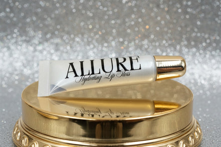 Allure lip balm tube on a beige background