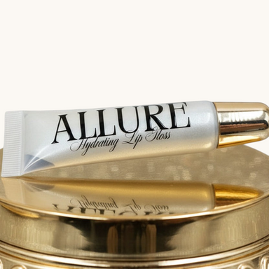 Allure lip balm tube on a beige background