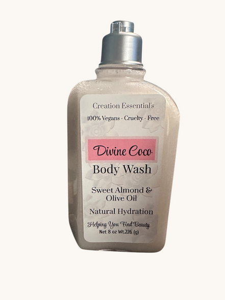 Creation Essential's Natural Body Divine Coco hydrating body wash with sweet almond and olive oil in a clear bottle.