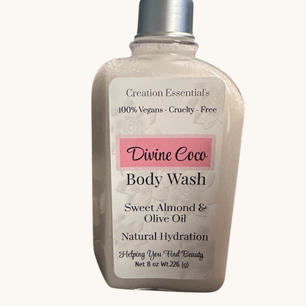 Creation Essential's Natural Body Divine Coco hydrating body wash with sweet almond and olive oil in a clear bottle.